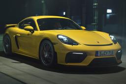 2022 Porsche 718 Cayman GT4 in yellow.